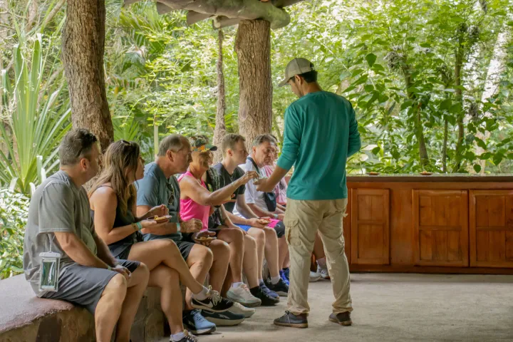a group of people sitting on a bench