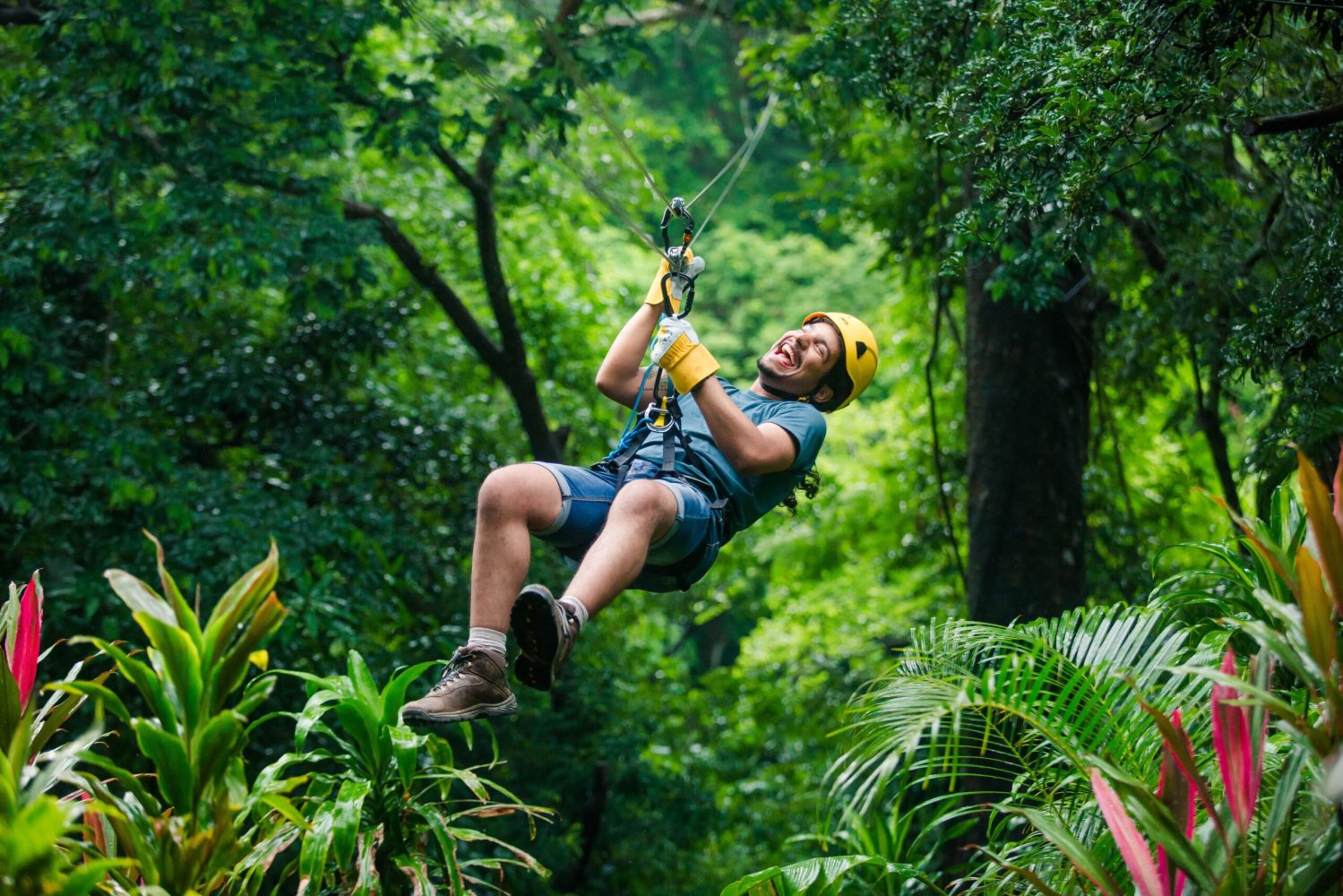 a man standing next to a tree