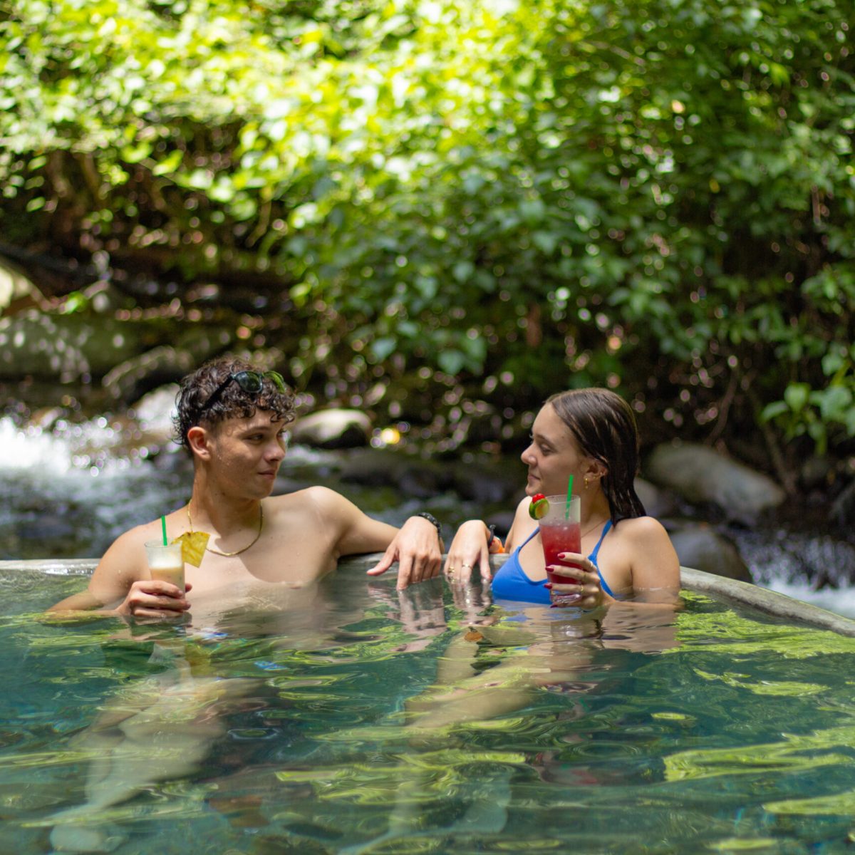 a girl in a pool of water