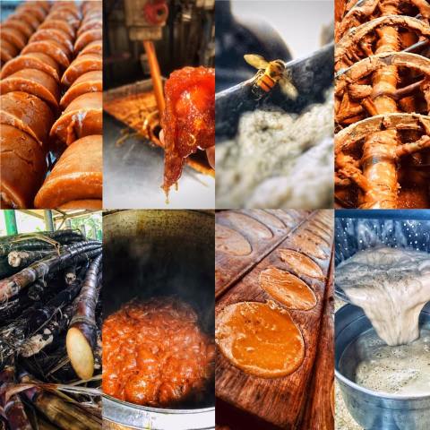 a bunch of hot dogs on a grill