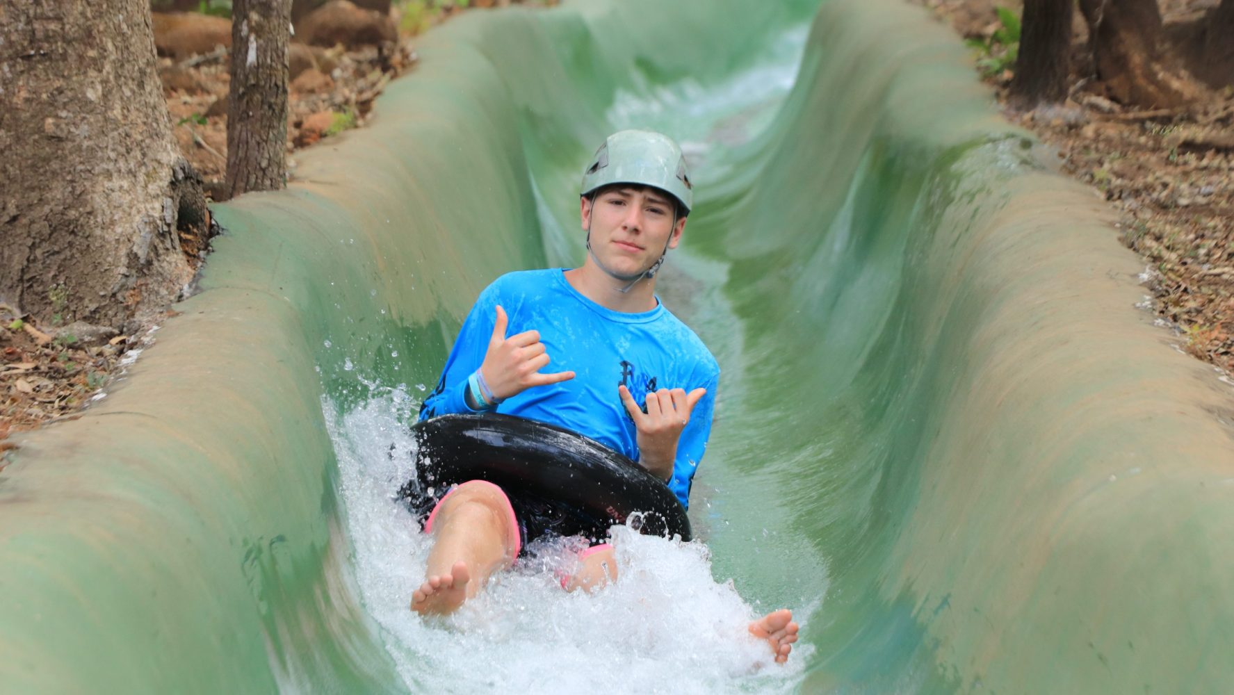 a man riding a wave on a surfboard in the water
